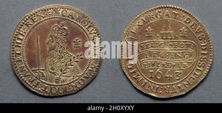 Triplice Unite o tre pezzi di sterlina: Charles i (obverse); Declaration on Scroll (reverse), 1643. Inghilterra, Charles i, 1625-1649. Oro; diametro: 4.6 cm (13/16 poll.). Quando la guerra civile o la Grande ribellione iniziarono nel 1642, Charles i, dopo aver innalzato il suo standard a Nottingham il 22 agosto 1642, combatté verso sud attraverso le battaglie di Edgehill e Brentford, ma non riuscendo ad entrare a Londra, finalmente insediò il suo quartier generale al Christ Church College di Oxford. A Wellington, Shropshire, il 19 settembre, il re aveva dichiarato al che avrebbe protetto 'la religione dei protestanti, le leggi di en Foto Stock