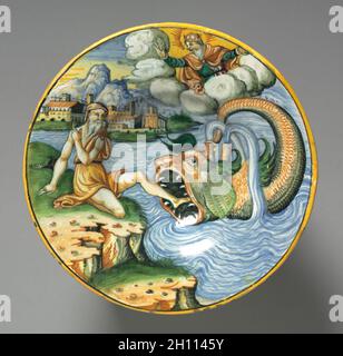 Piastra raffiguranti Giona, tardi 1500s. Francia, Lione, del XVI secolo. Stagno-terracotta invetriata (maiolica); diametro: 5,1 x 24,2 cm (2 x 9 1/2 in.). Foto Stock