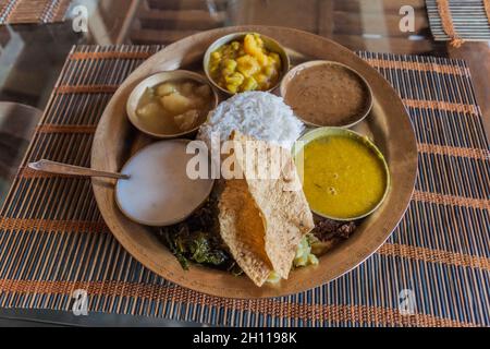 Piatto tradizionale di Assam Assamese Thali , India Foto Stock