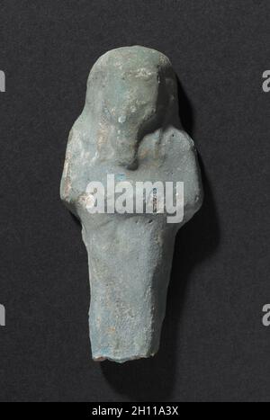 Shawabty di Ditamenpaankh, 715-656 A.C. Egitto, tardo periodo, Dynasty 25. La terracotta; complessivo: 6 x 2,6 x 1,5 cm (2 3/8 x 1 x 9/16 in.). Foto Stock