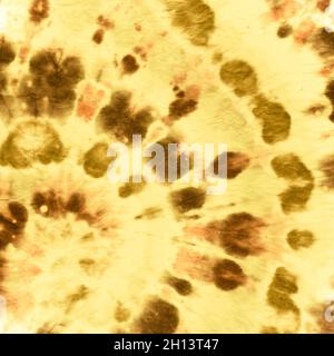 Tie Dye Spiral background. Stampa artistica Gold. Foto Stock