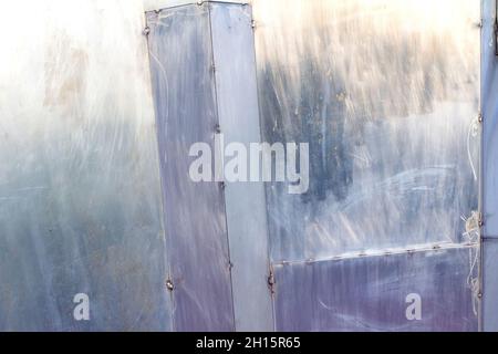 Texture foto di acciaio inossidabile blu armored piastre di superficie graffiate. Foto Stock