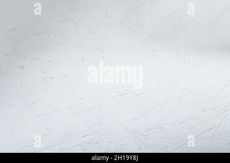 Una texture di una parete irregolare grigio chiaro Foto Stock