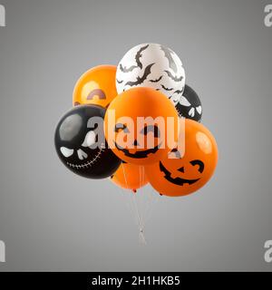 Palloncini di Halloween diversi su sfondo luminoso. Minimo concetto di vacanza. Foto Stock