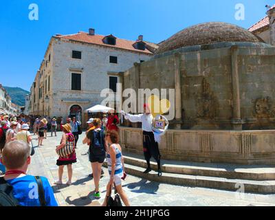 Dubrovnik, Croatia - June 07, 2015: The people walking on the street in the old town of Dubrovnik, Croatia at June 07, 2015 . Dubrovnik is a UNESCO Wo Stock Photo