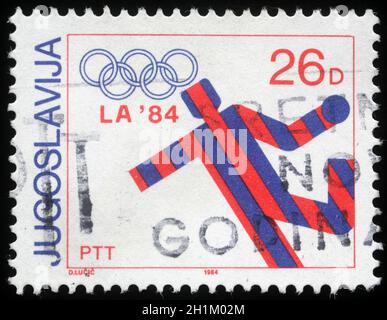 Francobollo stampato in Jugoslavia mostra le partite olimpiche a Los Angeles, circa 1984 Foto Stock