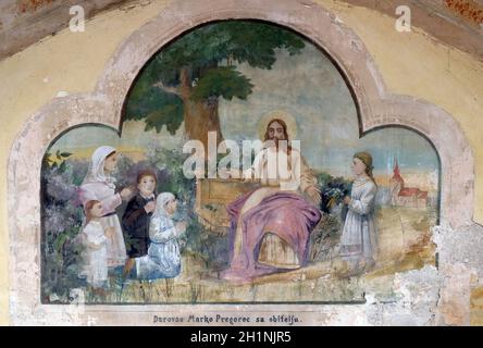 Gesù amico dei bambini piccoli, affresco nella Chiesa di San Michele a Vugrovec, Croazia Foto Stock