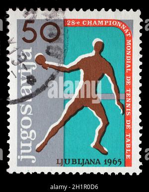 Timbro stampato dalla Jugoslavia mostra 28 tavola World Tennis Championship in Lubiana, circa 1965. Foto Stock