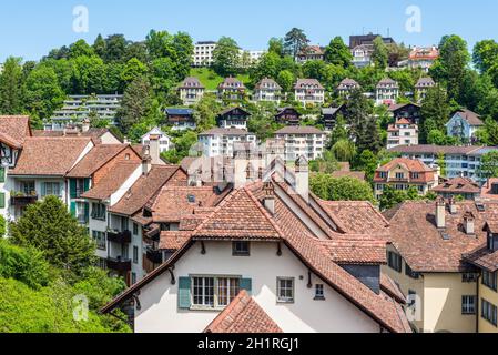 Bern, Switzerland - May 26, 2016: Architecture of the old European town and medieval tiled roof in Bern (Unesco Heritage), the capital of Switzerland. Stock Photo