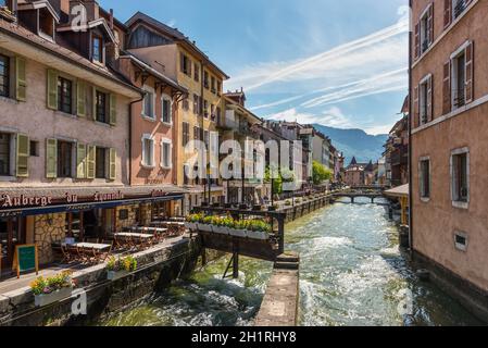 Annecy, France - May 25, 2016: View of the Thiou river flowing through the city of Annecy, capital of Haute Savoie province in France. Annecy is known Stock Photo