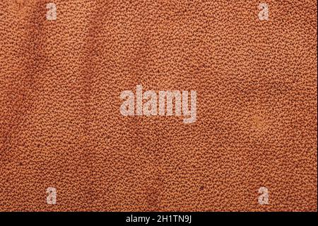 Sfondo in pelle marrone con vista ravvicinata macro a punti reali Foto Stock