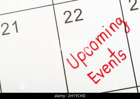 Prossimi eventi scritti su un calendario per ricordare a voi e appuntamento importante. Foto Stock