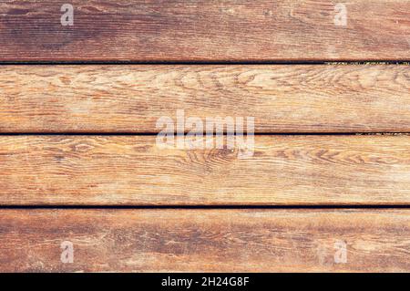 Grunge sfondo di legno intarsato dipinto ad intemperie. Vista ravvicinata della tavola in legno Foto Stock