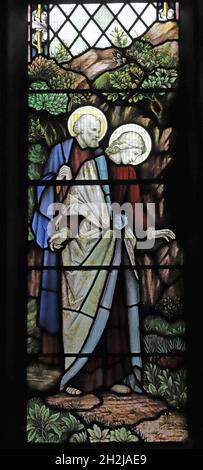 Una vetrata di Shrigley e Hunt raffigurante i discepoli Pietro e Tommaso presso la tomba vuota di Cristo, la chiesa di San Pietro, Dunchurch, Warwickshir Foto Stock