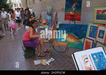 Europa, Spagna, Baleari, Maiorca, Palma di Maiorca, Straßenkünstler a der Altstadt, Carrer de San Miquel Foto Stock