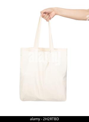 Mockup per borsa in tela con supporto a mano utilizzato come modello di design, isolato su sfondo bianco con percorso di ritaglio. Foto Stock