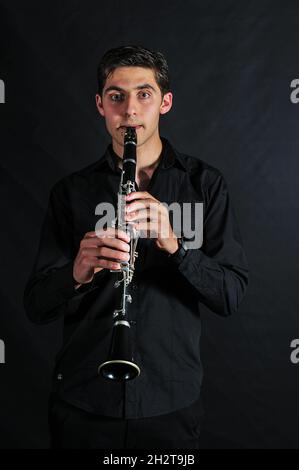 Gli studenti del Conservatorio di Musica si provano in aula. Foto Stock