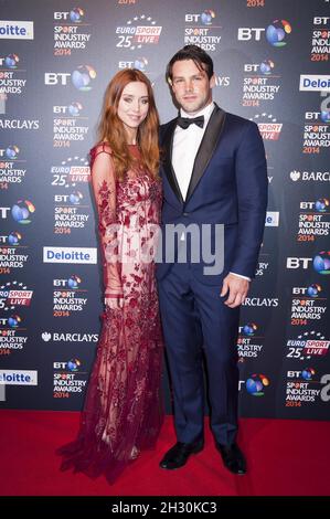 Una e ben Foden arrivano al BT Sport Industry Premi 2014 a Battersea Evolution - Londra Foto Stock