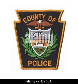 Cerotto del dipartimento della polizia DEGLI STATI UNITI isolato con sfondo bianco Foto Stock