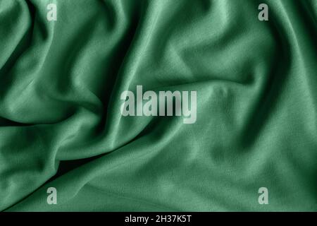 Tessuto Jersey in cotone. Sfondo tessile verde teal sbriciolato Foto Stock