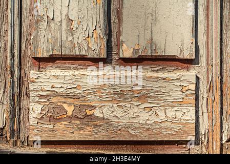 Pannello di legno da una vecchia serranda con vernice peeling. Sfondo vettoriale di tessitura del legno Foto Stock