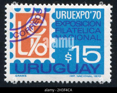 URUGUAY - CIRCA 1970: Timbro stampato dall'Uruguay, mostra URUEXPO Emblem, circa 1970 Foto Stock