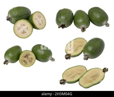 Impostare la frutta tropicale feijoa intere e tagliate a metà, isolati su sfondo bianco. Foto Stock