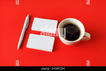 Biglietti da visita, caffè, penna Foto Stock