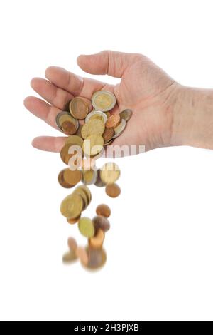 La mano e la caduta delle monete Foto Stock