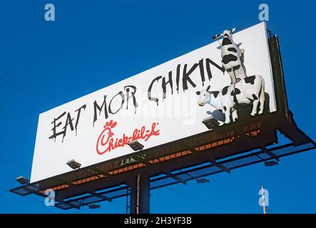 Chick-Fil-Abillboard mangiare Mor Chikin con le mucche Foto Stock