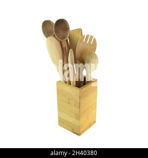 collezione di cucchiai di legno e utensili da cucina isolati su sfondo bianco Foto Stock