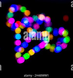 Astratto soft focus luci in una notte buia Foto Stock