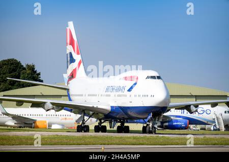 Una fila di British Airways 747's all'aeroporto di Cotswold a Kemble Gloucestershire ritiene di essere in attesa di un'azienda di salvataggio dell'aria per recuperare le parti durante il Th Foto Stock