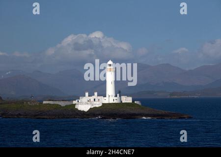 Eilean Musdile (Mansedale) isoletta e faro a sud-ovest di Lismore nelle Ebridi interne Foto Stock