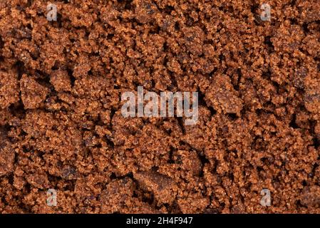 Fondo di zucchero di muscovado. Barbados zucchero, khandsari o khand. Vista dall'alto. Foto Stock