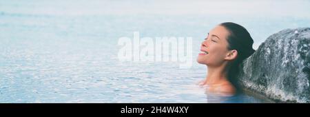 Wellness outdoor spa hot spring donna relax in piscina in Islanda. Turista asiatico godendo relax resort vacanza di lusso. Foto Stock