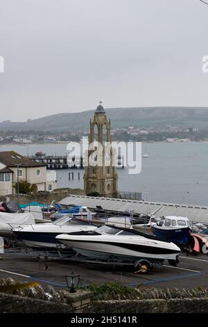Wellington Clock Tower con molo dietro Foto Stock
