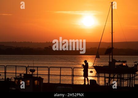 Tramonto al porto di pesca di Ballycotton County Cork, Irlanda Foto Stock