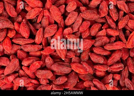 Sfondo di wolflaces cinese. Mucchio di bacca di goji secca. Vista dall'alto. Foto Stock