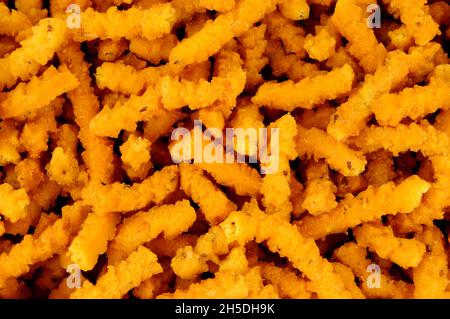 Chakri indiano saporito piccante riso croccante fondo snack bastone Foto Stock