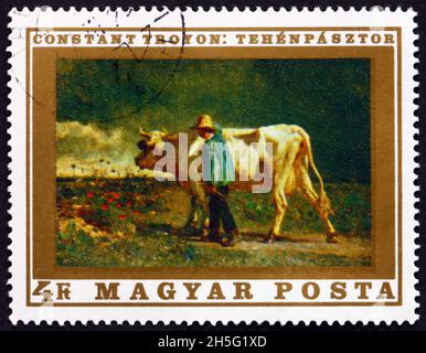 UNGHERIA - CIRCA 1969: Un francobollo stampato in Ungheria mostra il Cowherd, dipinto di Constant Troyon, pittore francese, circa 1969 Foto Stock