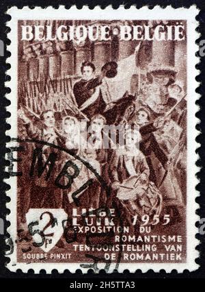 BELGIO - CIRCA 1955: Un francobollo stampato in Belgio mostra la partenza di volontari da Liegi, 1830, dipinto da Charles Soubre, circa 1955 Foto Stock