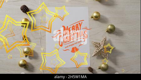 Immagine di buon testo di natale su baubles Foto Stock