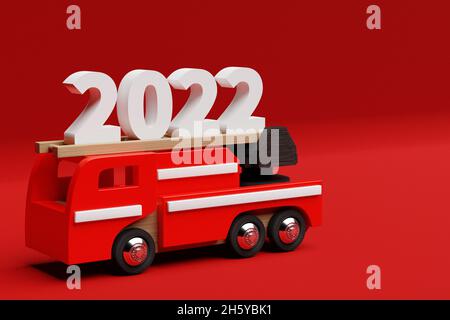 Illustrazione 3D un modello di un camion del fuoco giocattolo dei bambini porta l'iscrizione 2022 su sfondo rosso. Il concetto di Capodanno e Natale in Foto Stock