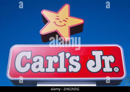 Carl's Junior Restaurant Sign (Star Man acquistato da Hardees), Yuma, Arizona; ca. 2003 Foto Stock