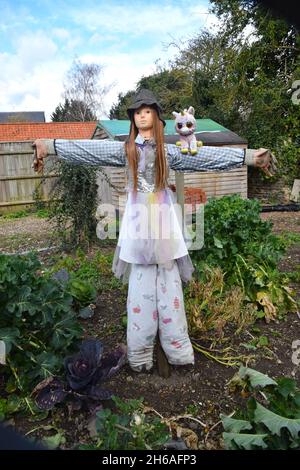 scarabro femminile con giocattolo morbido unicorno Foto Stock