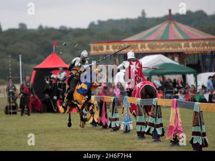 La foresta di Epping organizza il suo Festival della Foresta situato all'interno dei terreni della residenza di caccia della regina Elisabetta. L'evento include giostre, cavalieri medievali e corse gratuite in autobus. Foto Stock