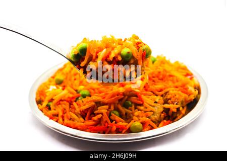 Un'immagine della ricetta di Veg biryani con focus selettivo Foto Stock