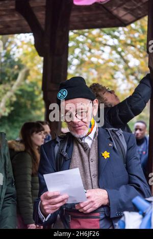 Protestor, Rise and Rebel march, Extinction Rebellion, Londra, UK. 13 novembre 2021 Foto Stock