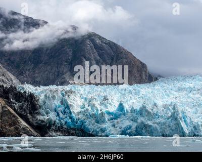 Il South Sawyer Glacier di Tidewater si incontra con la roccia, Tracy Arm, Alaska sud-orientale, Stati Uniti d'America, Nord America Foto Stock